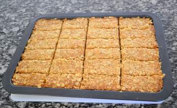 A tray of freshly baked oat bars