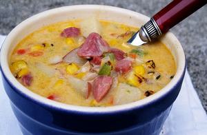 Amish corn chowder in a blue ceramic bowl