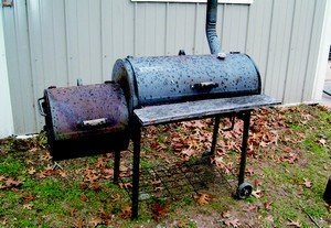 a barrel wood smoker