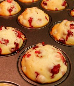 Cranberry muffins just come out of the oven.