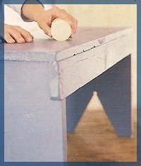  Putting wax on furniture for distressing technique