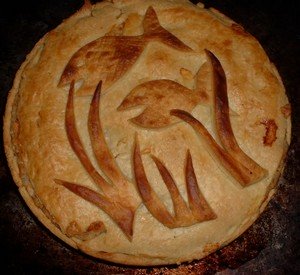easy fish pie with a fish design on the pastry