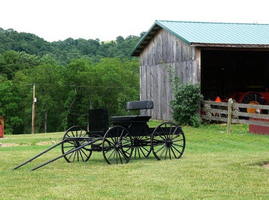 Farm 2wagon and a barn.