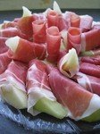 Melon and ham roll ups.