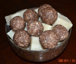 homemade soap balls and olive oil soap in a copper bowl