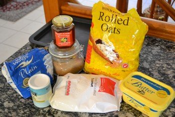 All ingredients for making oat bars.