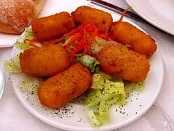 A pile of turkey croquette made from leftovers.