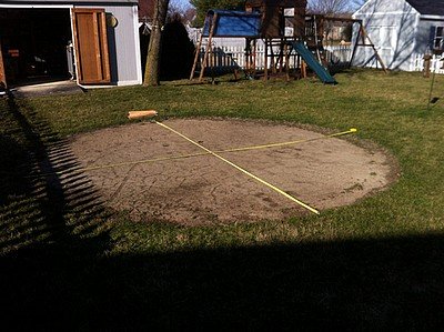 Measuring out the patio area.