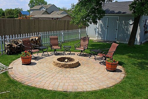 Outdoor patio furniture around the fire pit and patio.