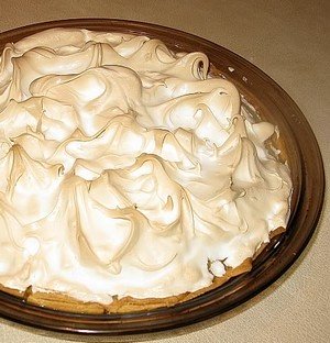 Pumpkin meringue pie cooked and waiting to be eaten.