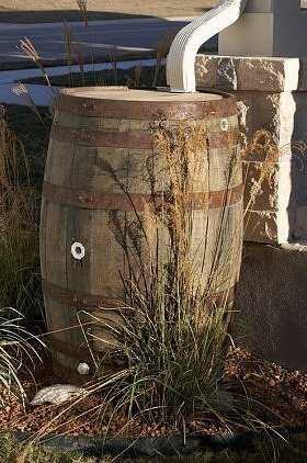 a wooden rain-barrel