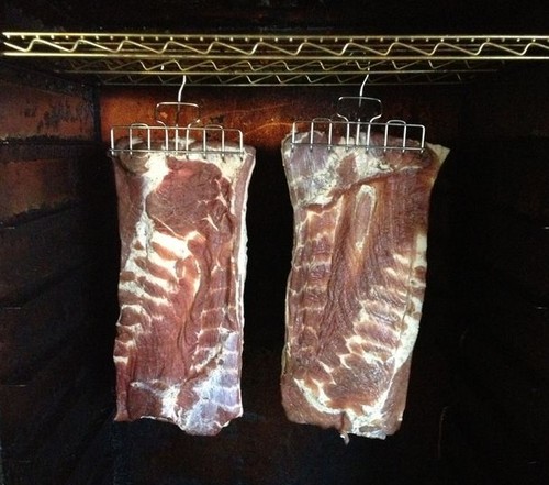 Smoking bacon and hanging it in the smoker