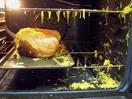 A burst spaghetti squash that wasn't pricked in the oven.